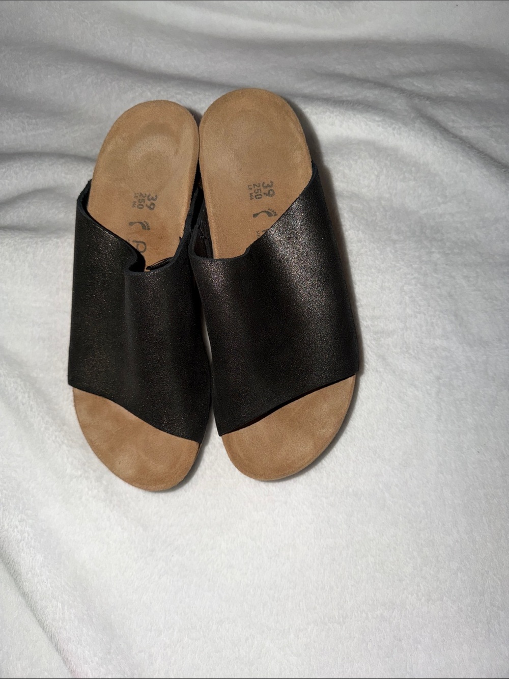 Women’s black leather Birkenstock with wedge heel